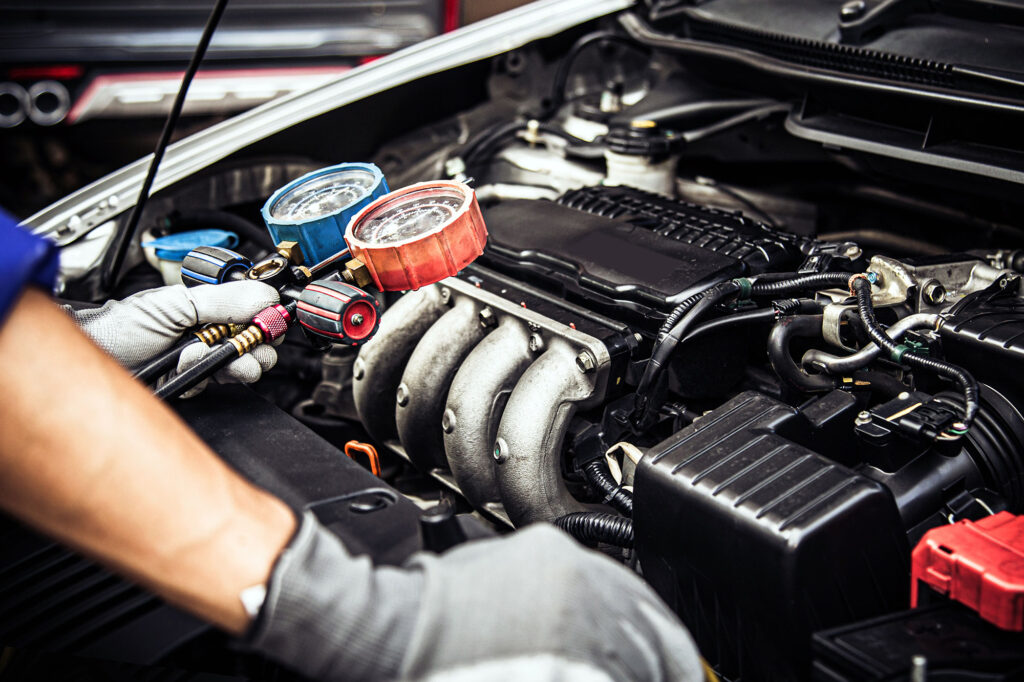 air conditioning check on car with gauges